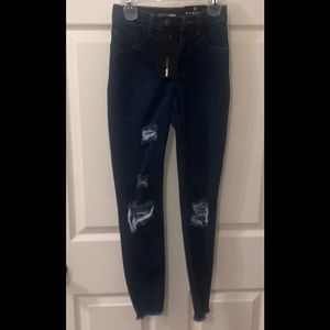 Dark blue denim ripped jeans